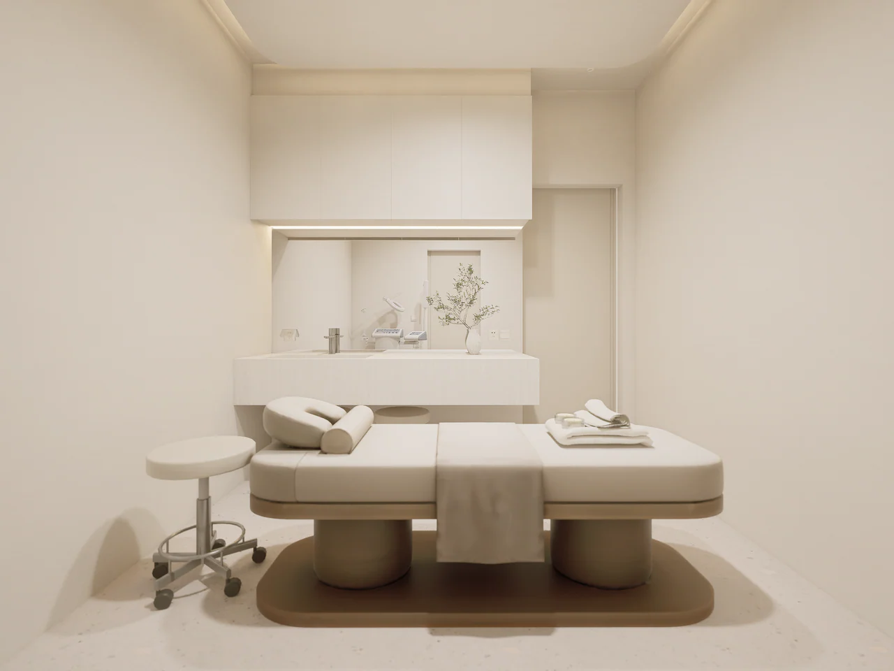 Design visualisation of a treatment room with a reclining bed, worktop and overhead storage.