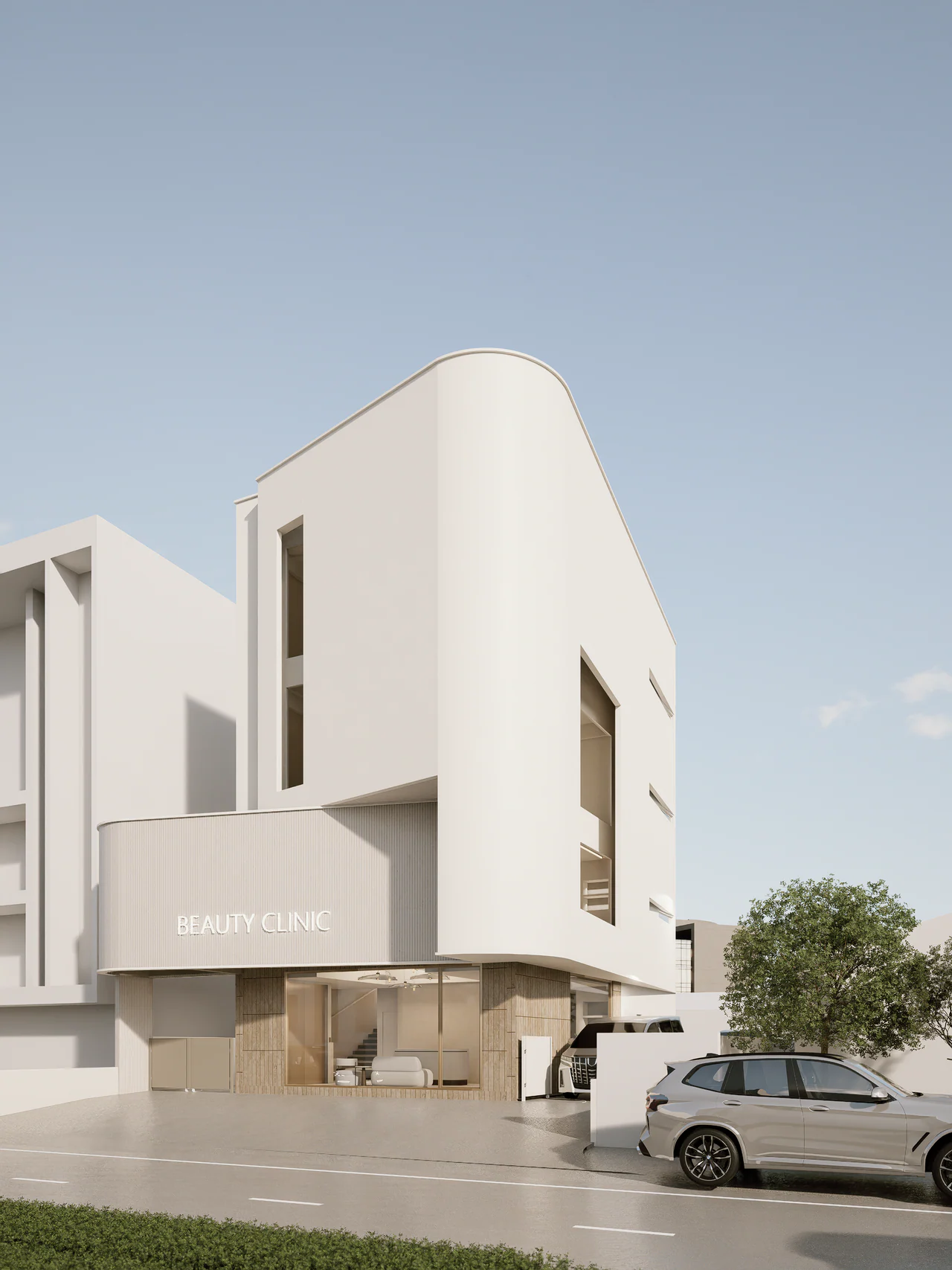 Design visualisation of the pale, rounded SUKHUMVIT 105 facade viewed obliquely from the street.