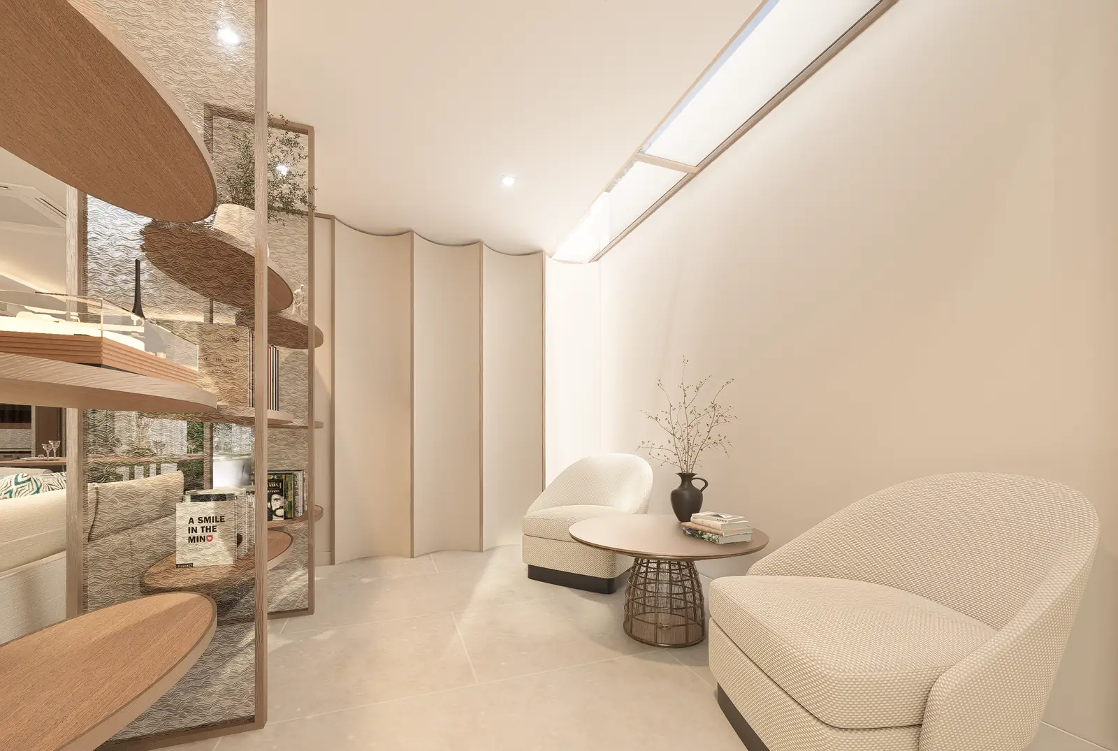Two upholstered chairs and a small round table beside open shelving and a high-level opening.